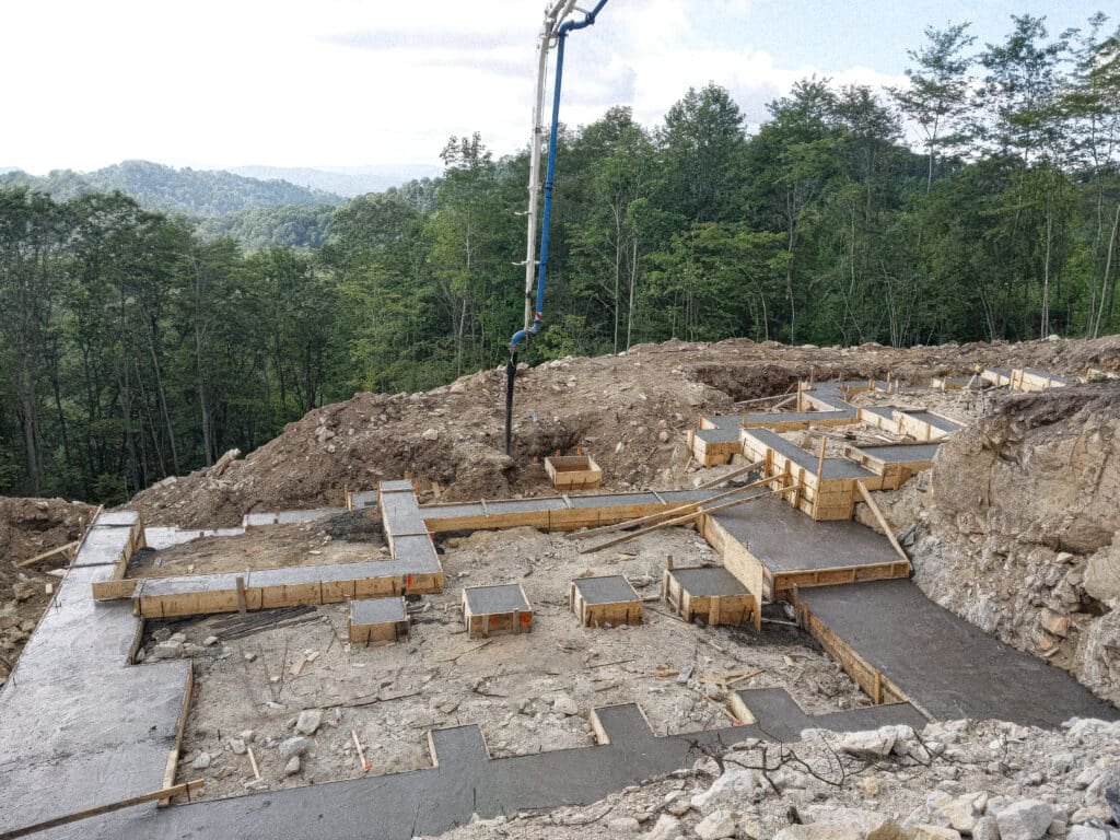 Concrete Foundation Being Poured into frames